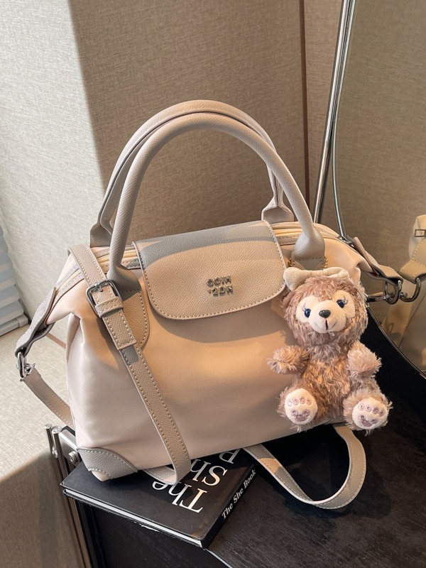 Nylon color contrastante empalme bolso de bolsillo portátil mujer 2024 nuevo estilo transfronterizo de alta calidad exquisita mochila de hombro