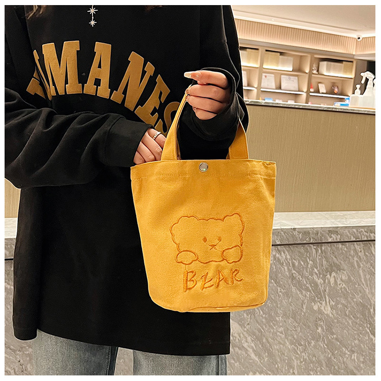 Personalized ladies' bucket bag, versatile and cute canvas bear wholesale, simple Japanese style new handbag undefined