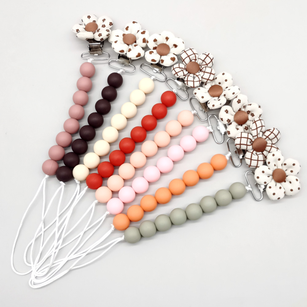 AliExpress new baby cartoon flower pacifier clip to comfort baby creative silicone bite pacifier anti-chain