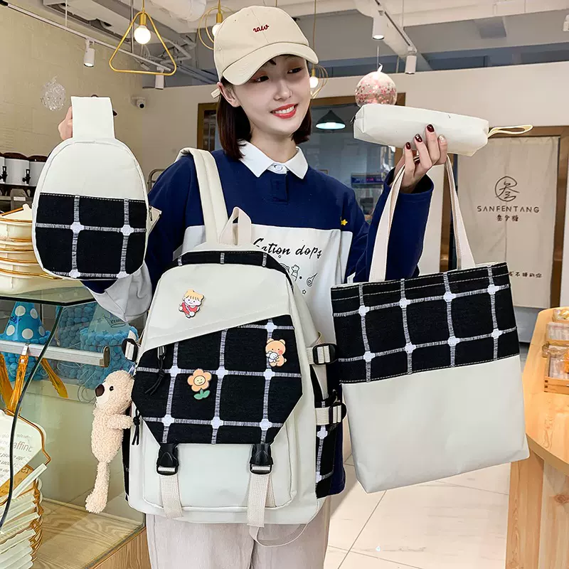 新款护脊耐磨双肩包女韩版时尚帆布格子书包大容量学生背包批发
