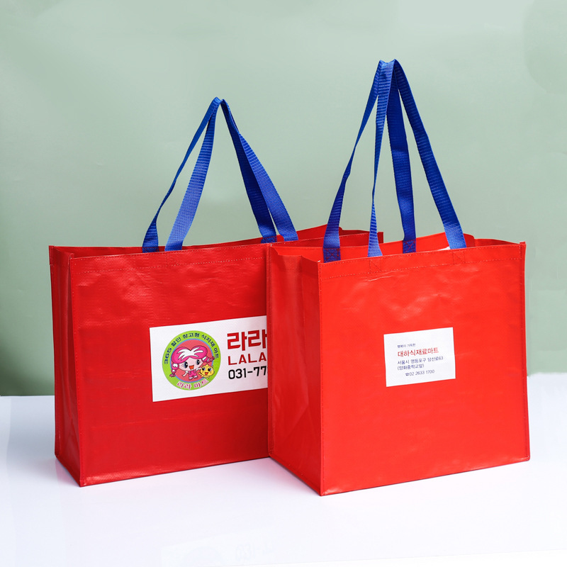 手提编织袋定 做加厚pp塑料覆膜购物袋复合彩印蛇皮编织袋定 制