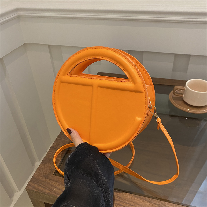 Elegant Women's Round Crossbody Bag With Unique Texture Design_voghion.com