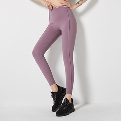 High-waisted butt-lifting fitness pants, feminine running, quick-drying, tight-fitting, belly-controlling, threaded yoga trousers for outer wear in autumn and winter.
