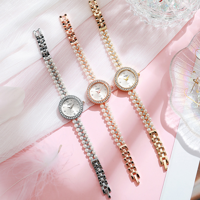 Reloj de pulsera de perlas con cara de gota de agua redonda de lujo ligero transfronterizo moda hecha a mano con cuentas regalo temperamento reloj de mujer al por mayor