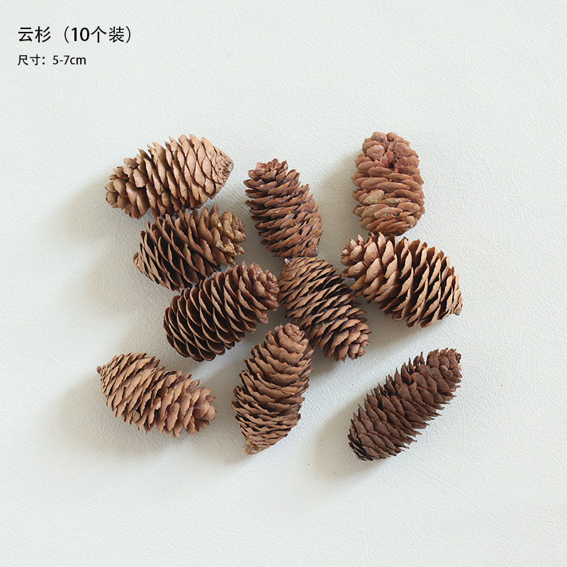 Buscando madera cruzando decoraciones navideñas colgantes de pino natural salvaje guirnaldas de pino material DIY camino de disparo de Navidad