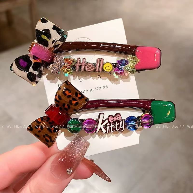 original light luxury south korea heavy industry colorful crystals leopard bow side clip high-grade dripping oil side broken hair elegant hair pin