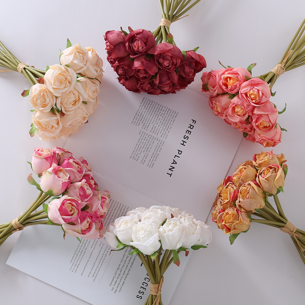 Nuevo estilo de tela de seda para bodas 12 racimos de borde de plátano rosa flor artificial hogar hotel mesa de comedor decoración rosa transfronteriza artificial