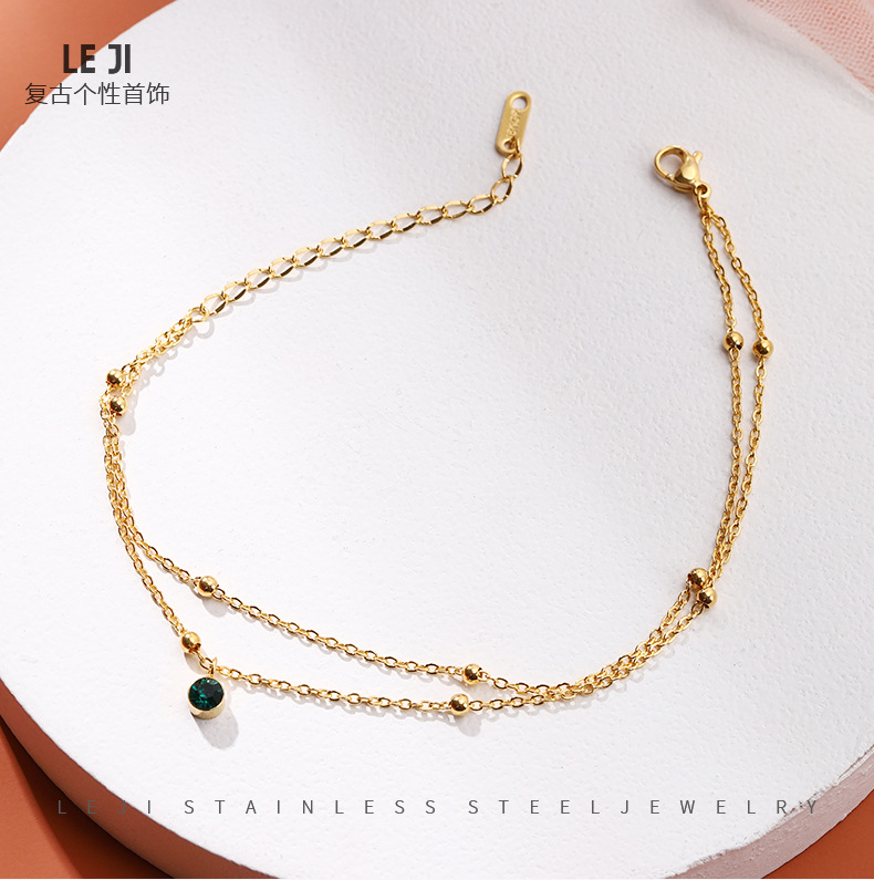 JL-0124: Oro elegante Esmeralda