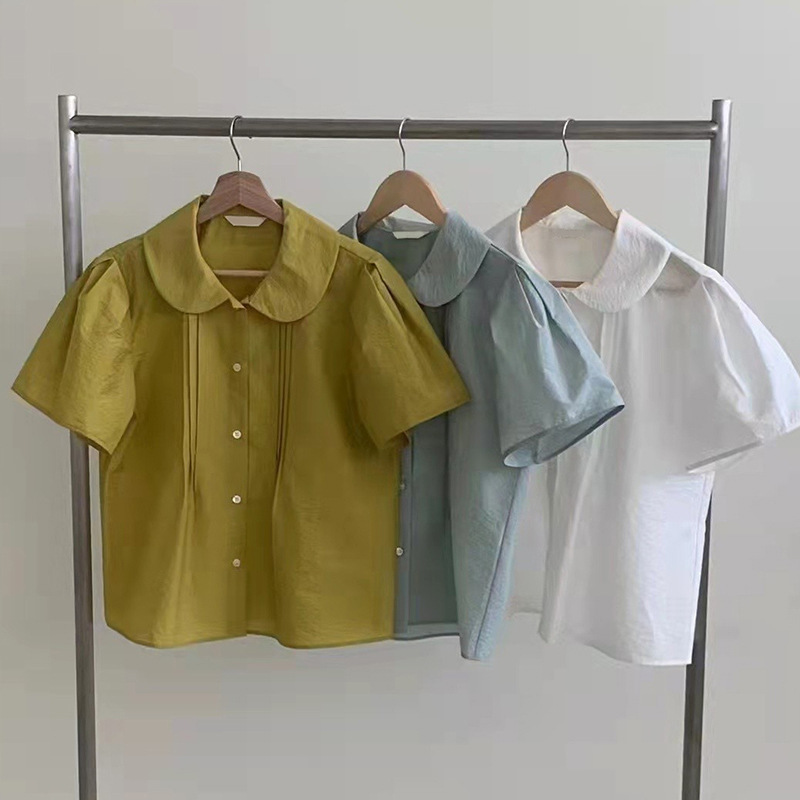 Korean Dongdaemun Women's Fashion 2026 Summer Simple Doll Collar Solid Color Short-Sleeve Shirt Top Trendy Patchwork Design Korean Dongdaemun Women's Fashion 2026 Summer Simple Doll Collar Solid Color Short-Sleeve Shirt Top Trendy Patchwork Design