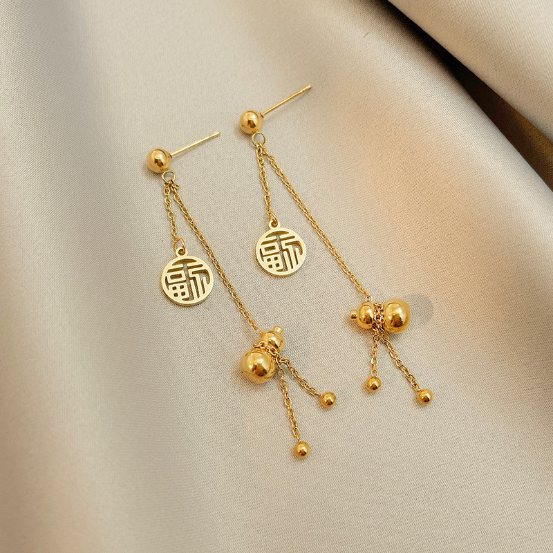 Pendientes de estilo étnico de la mujer pendientes largos de la borla del diseñador único nicho pendientes de temperamento retro pendientes