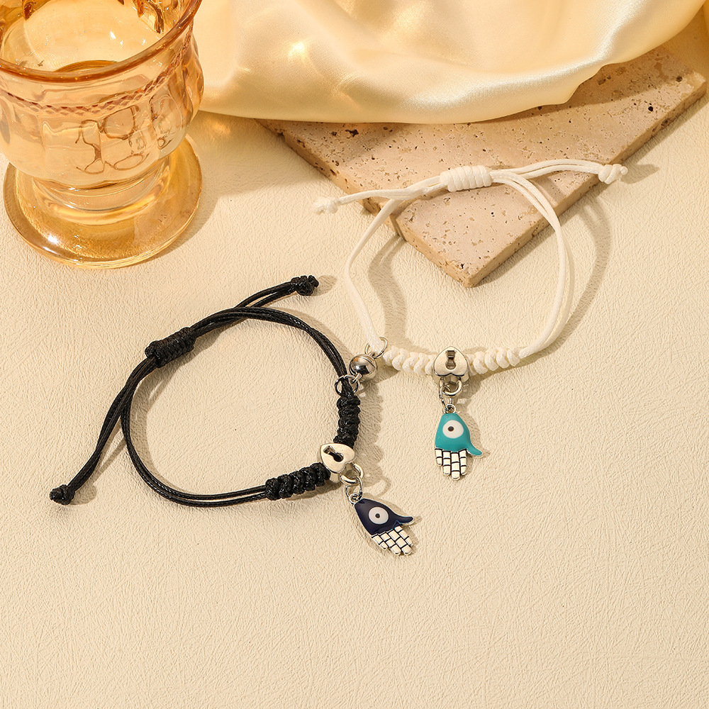 Moda europea y americana simple creativa ins blanco y negro con pareja cruzada cuerda tejida a mano traje pulsera