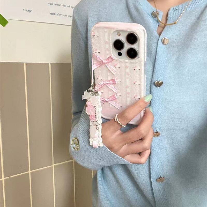 Dulce lazo de encaje rosa para iPhone15 funda para teléfono móvil 14pro max mujer 13pro colgante 12