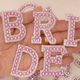 烫图、烫钻;布贴;洗唛、商标