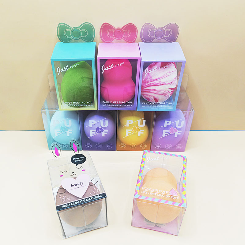 Huevos de maquillaje de belleza, huevos de maquillaje de color, huevos de maquillaje de aire, polvo de maquillaje, caja de PVC transparente, huevos de maquillaje de uso seco y húmedo.