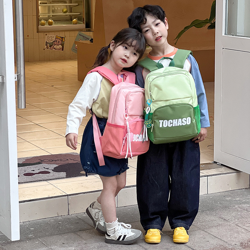 Mochila de moda para niños y niñas en contraste, letras de estilo occidental, mochila escolar de escuela primaria de gran capacidad, nueva mochila para niños transfronteriza
