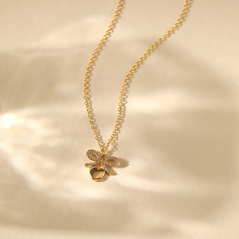 8g Weight 18K Gold Plated Plating Material Copper Pendant Material Zircon Inlay Material Pendant Necklace Classification Copper Chain Material cable chain Chain Type 1 Piece Quantity Daily Occasion Copper Material Heart Shape, Flower, Bow Knot Pattern Women's Gender Inlay Design Sweet Style Copper 18K Gold Plated Inlay Heart Shape Flower Bow Knot Zircon Pendant Necklace 17