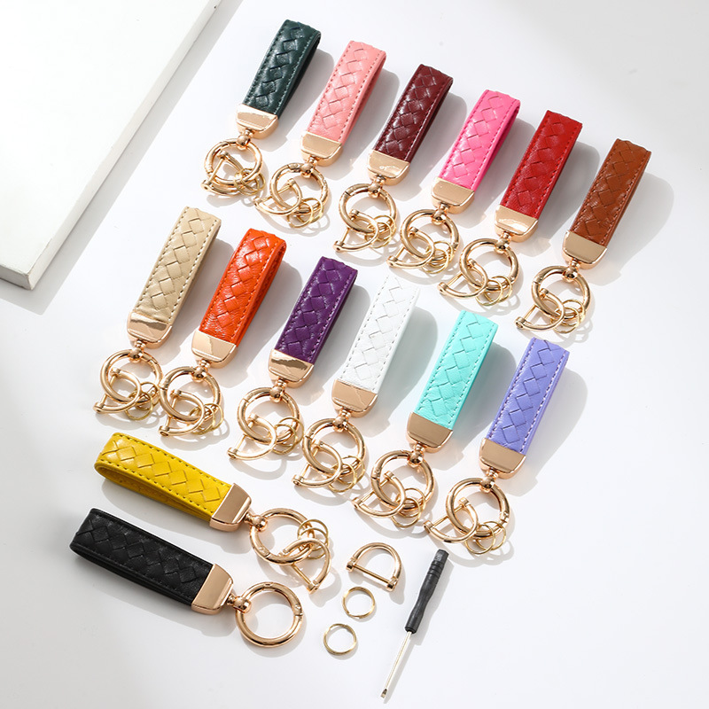 Top layer lambskin keychain French light luxury hardware men's and women's car pendant metal woven leather key ring