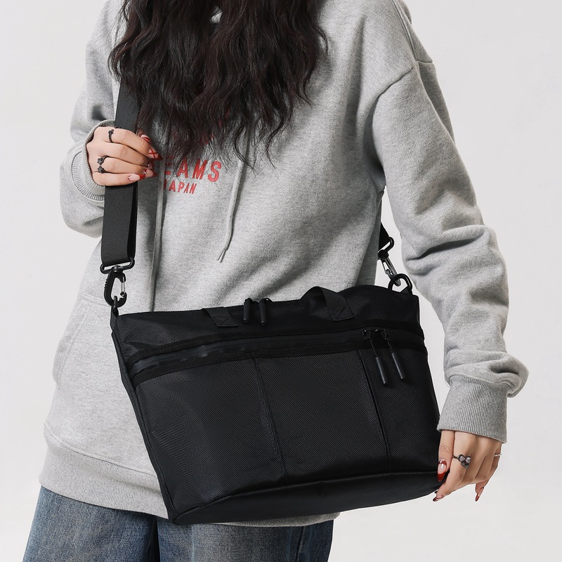 Bolso bandolera de tela Oxford de diseño de nicho para mujer 2024 nuevo bolso tote de viajero urbano de todo fósforo bolso de hombro para hombre