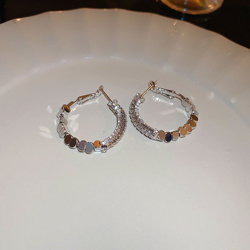 Aguja de plata circón roto círculo de plata pendientes europeos y americanos nicho diseño sentido pendientes elegante luz lujo moda alto sentido pendientes