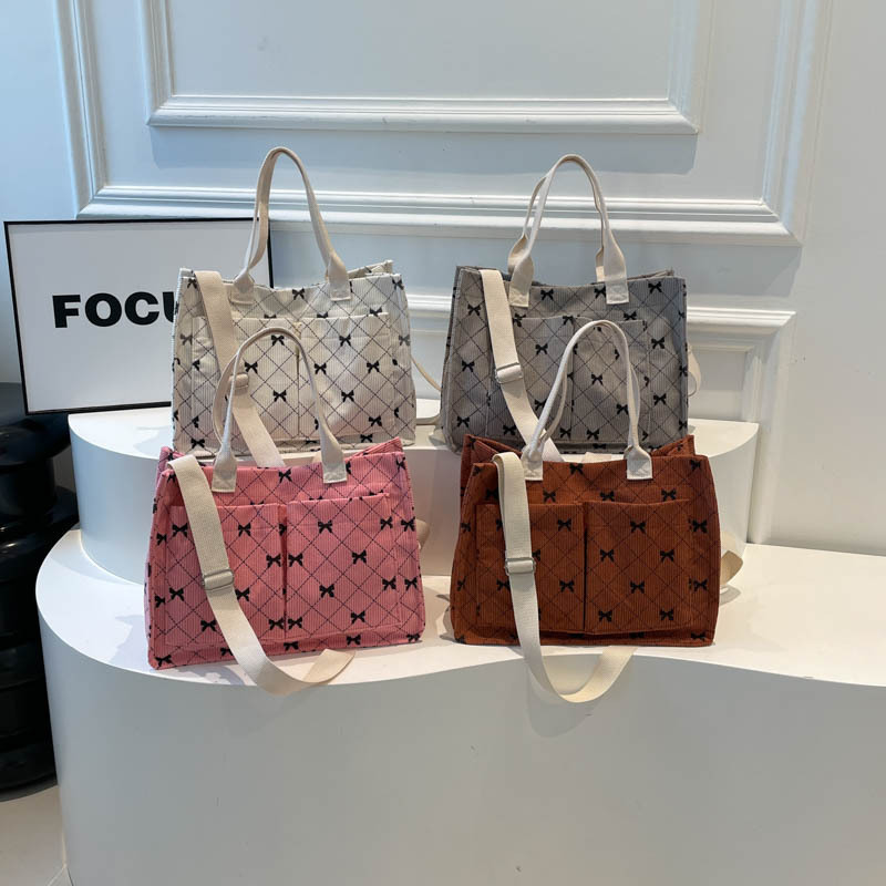 大容量蝴蝶结灯芯绒托特包2025秋冬新款斜挎包韩版ins单肩手拎包