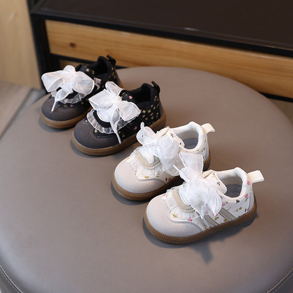 Demi-season children's non-slip white sneakers for early age