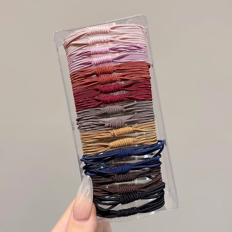 Cuerdas de cabeza de alta sensación multi-círculo de goma cuerdas de cabello de cabello de cola de caballo de alto anillo de cabello de alta elasticidad cubierta de cuero al por mayor