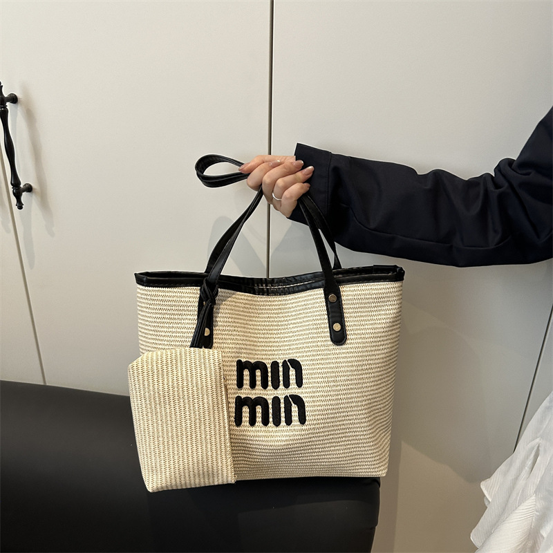 2025 nuevo este año popular bolso de mujer gran capacidad bolso de hombro universal bolso de clase de estudiantes universitarios