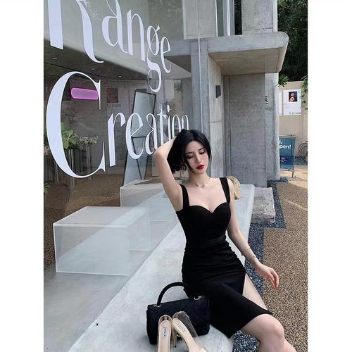 For international trade, please check the actual product before placing an order. It features a unique design with a built-in chest pad, black color, sexy side slits, and a double-shoulder dress.