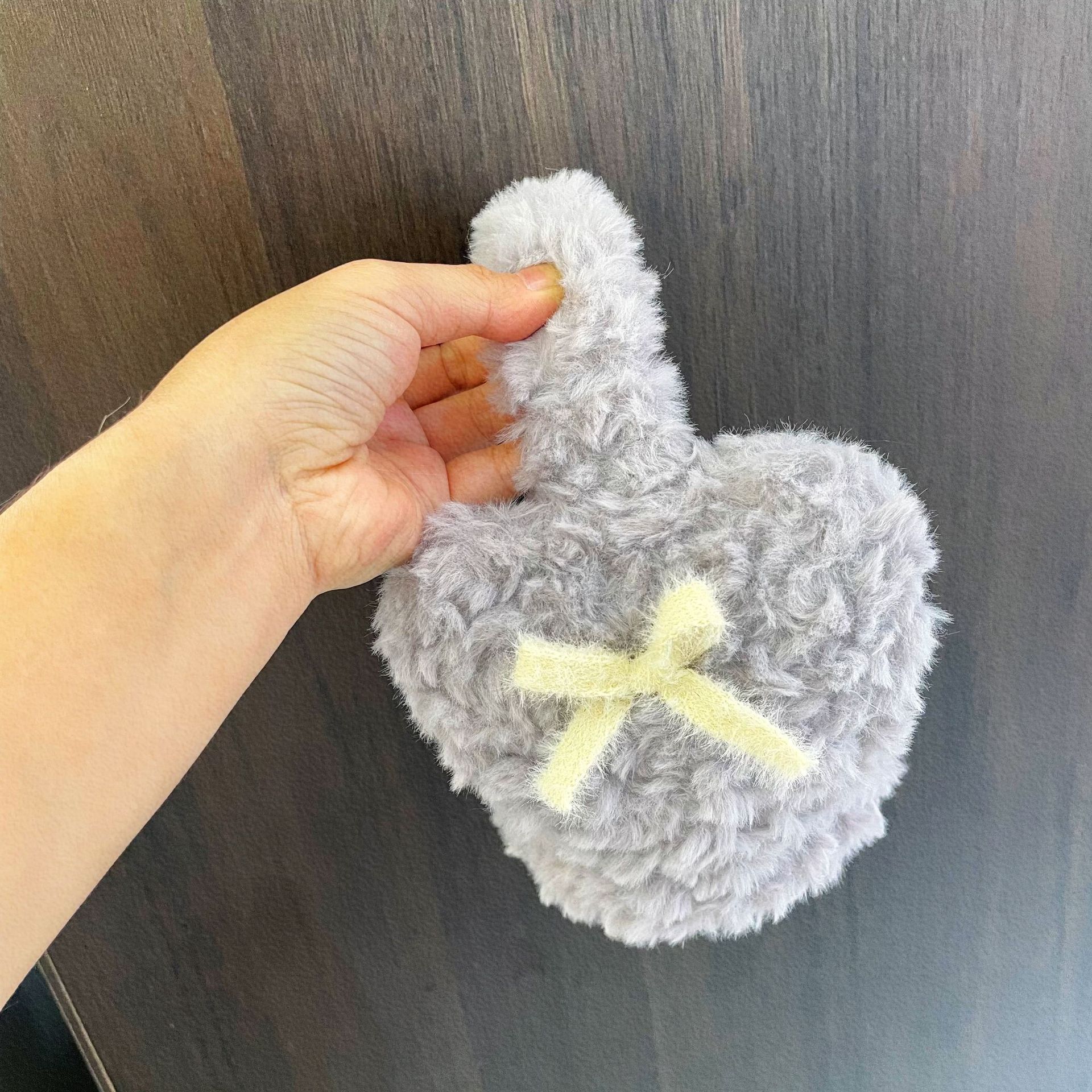 秋冬の韓国系のベルベットの蝶結びの耳カバーは防寒保温愛の耳を厚くして子供の耳を覆っています。