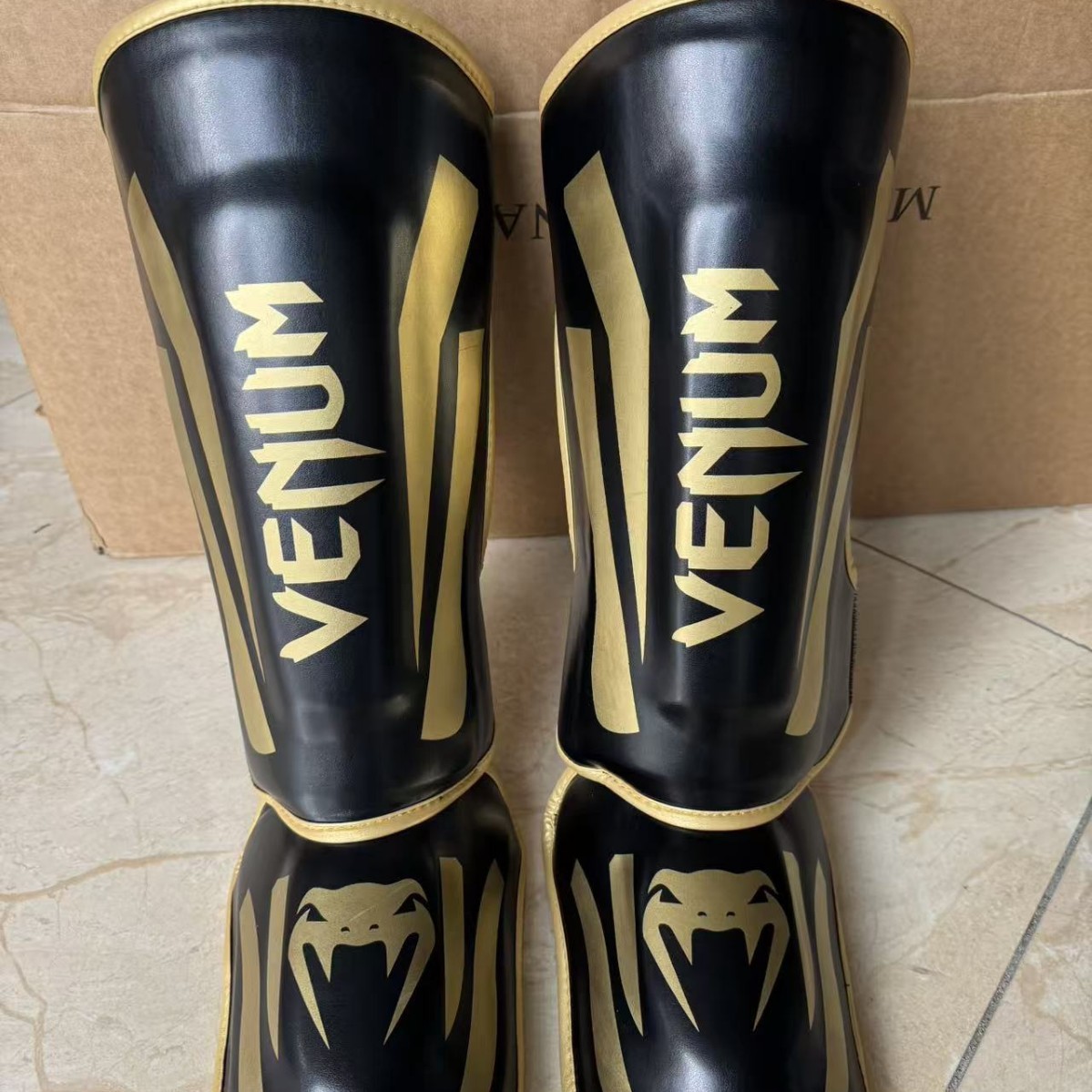 Thickened leg guards for Sanda, boxing, Muay Thai, and combat training