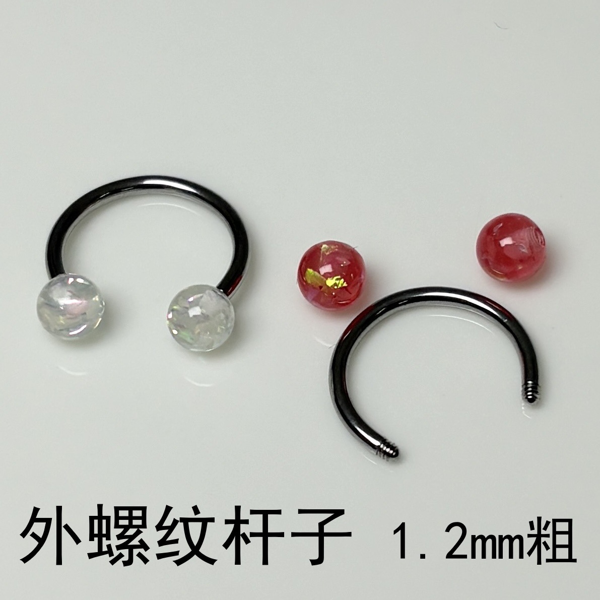 Silver pointed spike labret stud material detail