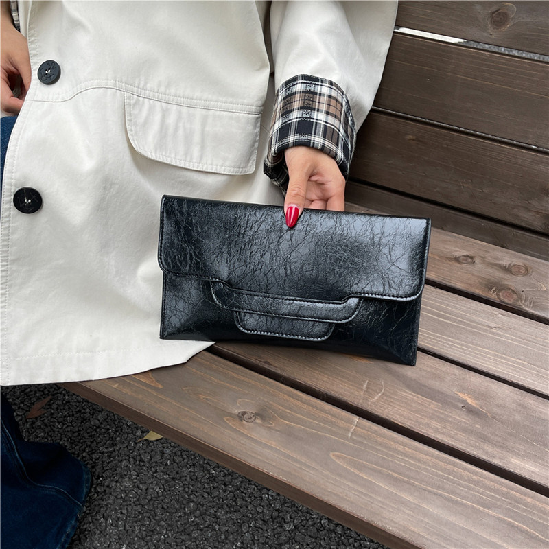 Bolsa de cena de alta calidad de color sólido universal moda de mujer ocio de gran capacidad temperamento personalidad bolso de cambio bolso de mano