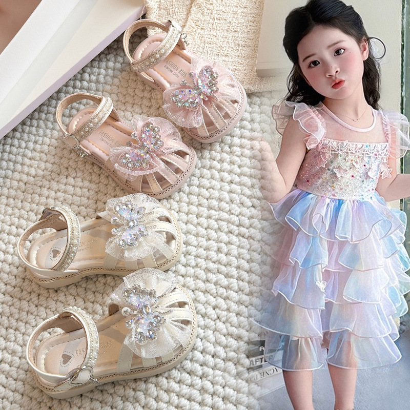 Niñas sandalias Baotou 2026 verano nuevo estilo de moda infantil versátil zapatos Lefour zapatos de princesa con suela suave para niños
