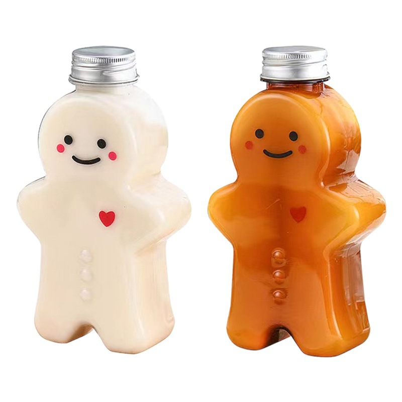 Pastel de jengibre de dibujos animados Hombre taza de té de leche en forma de botella de plástico desechable jugo botella de bebida PET para llevar jugo de leche botella de té