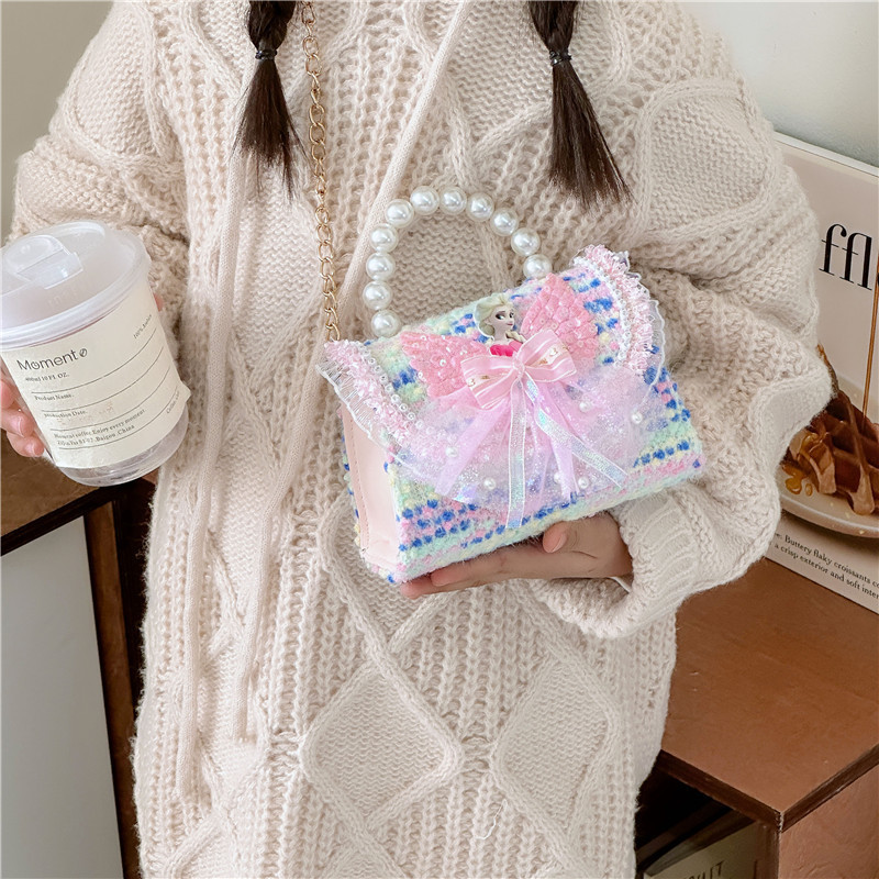 Nuevo bolso infantil, bolso de moda, bolso de princesa, bolso de niña encantador, bolso de mochila para bebés en línea, popularidad