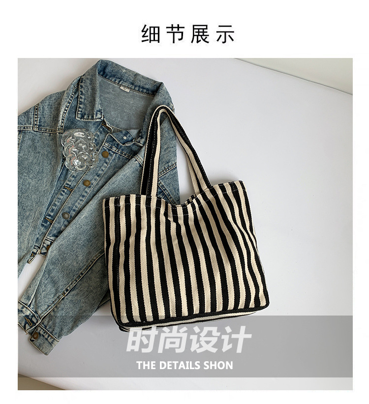 2024 Autumn/Winter new versatile and fashionable striped handbag shopping bag, two-tone large-capacity trendy single-shoulder bag Application Scenario