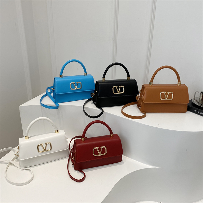 Personalidad europea y americana retro simple bolso de hombro 2025 primavera nuevo bolso de moda hermoso bolso de mochila pequeña mujer