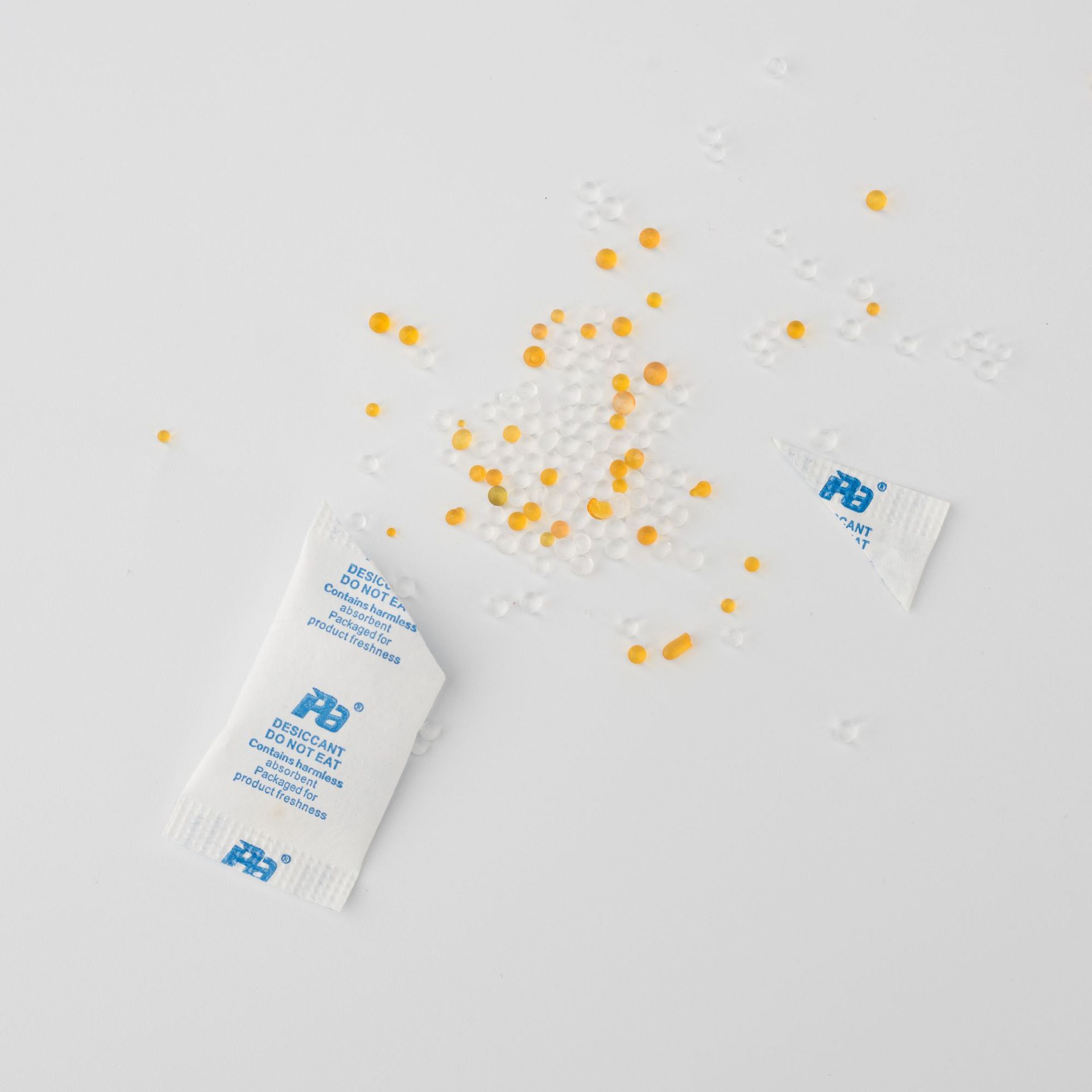 personalización de gel de sílice de color desecante cápsula de productos de salud medicina impermeable papel de algodón de perlas absorbente de humedad gel de sílice puro