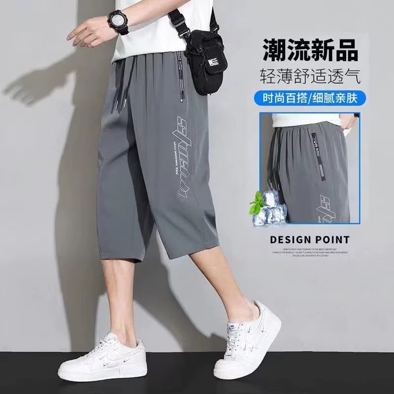 男性の夏の薄いタイプの氷の糸の速乾の7分の半ズボンのゆったりしている運動のファスナーのポケットのカジュアルな膝のまっすぐな筒のズボン|undefined