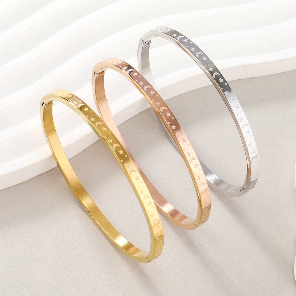 Joyería de acero inoxidable exquisita transfronteriza O-tipo hebilla pulsera mujer corrosión estrella Luna titanio acero pareja pulsera fábrica