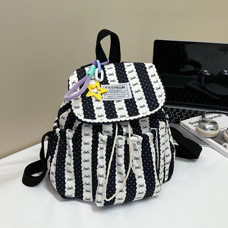 2026 nueva mochila de alta capacidad de moda simple mochila de estudiantes de secundaria a rayas de color contrastante popular dulce hombro