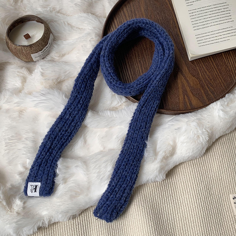 Otoño y invierno bufandas mujeres 2025 nuevo color sólido caliente de protección de cuello de lana de punto largo bufandas al por mayor