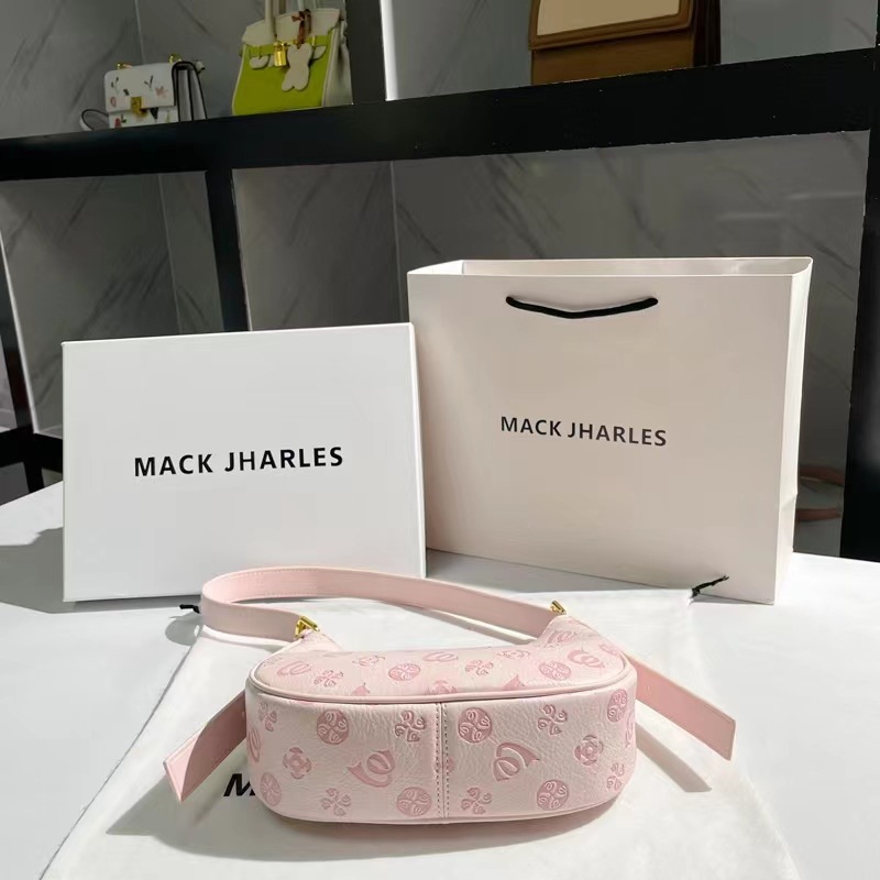 Comercio exterior al por mayor nicho Rosa axila bolsa de verano de las mujeres 2022 nueva moda Tongqin francés palo bolsa de hombro media luna