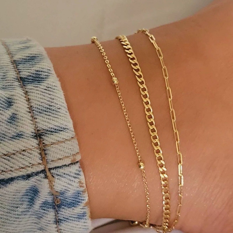 Europa y los Estados Unidos transfronterizos bohemios de viento plano cadena de serpiente torbellino de tres piezas conjunto de cadenas de tobillas multicapa de arena de verano para mujeres