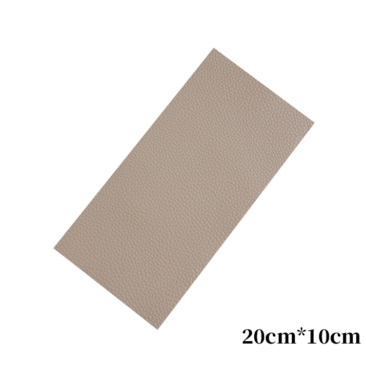 Los fabricantes suministran el subsidio de reparación de cuero de color autoadhesivo completo PU Litchi grano Road pegatinas sofá cojín agujero parche pegatinas