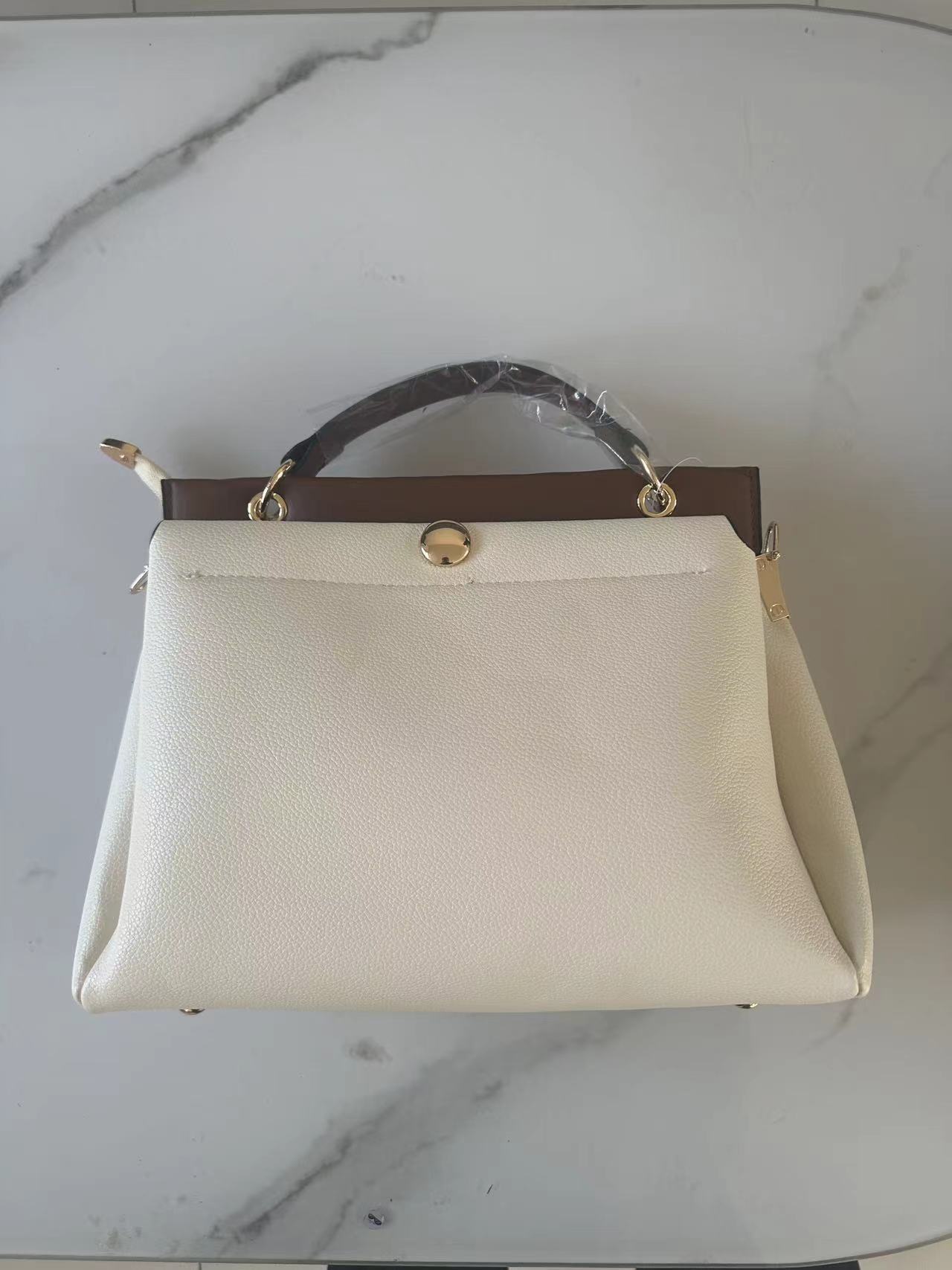 Foreign trade commuter women's bag 2024 spring and summer new contrast color handbag single shoulder crossbody women's bag large capacity women's bag_voghion.com