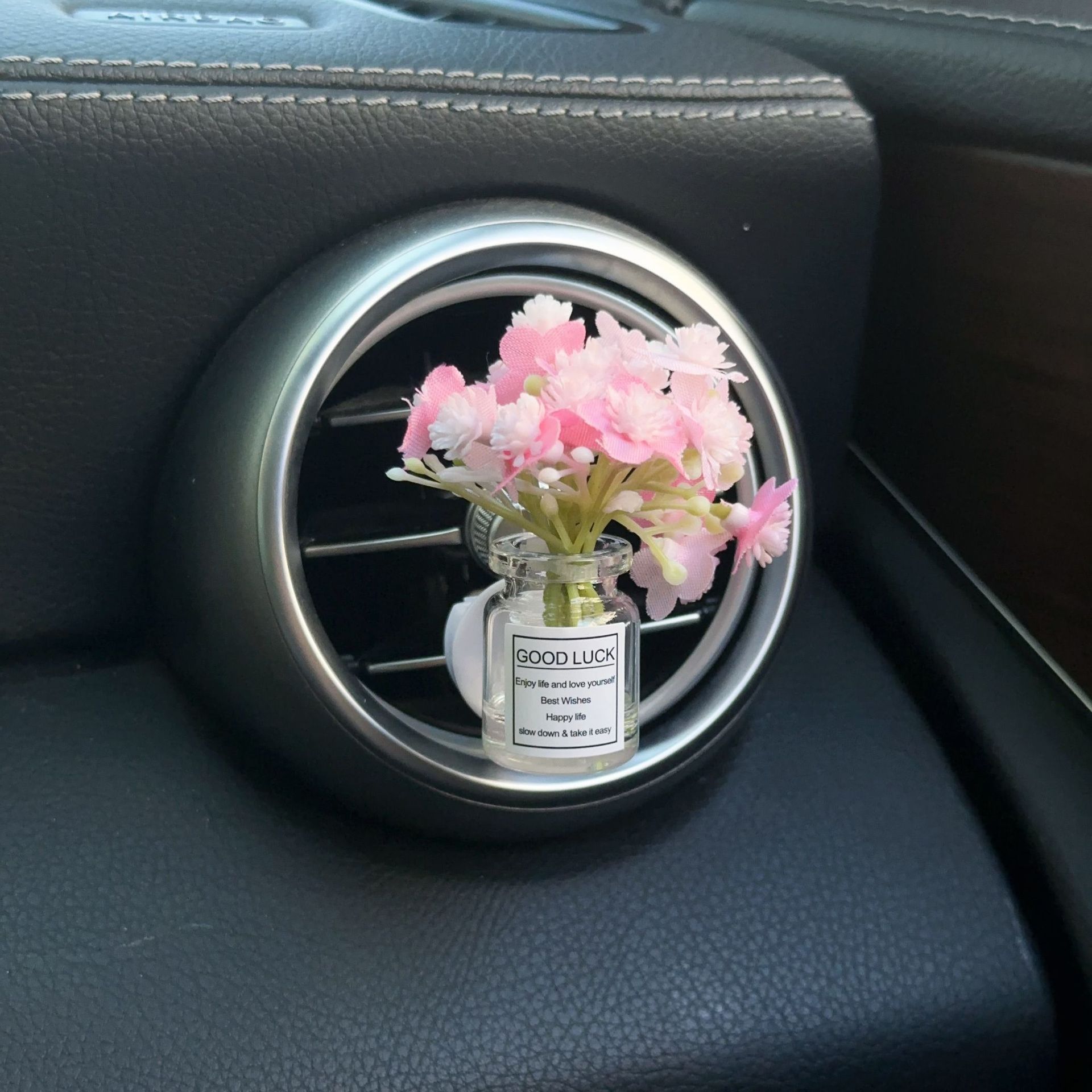 Decoración creativa de salida de aire del automóvil con flores de estrellas pequeñas frescas aire acondicionado botella de perfume de perfumes