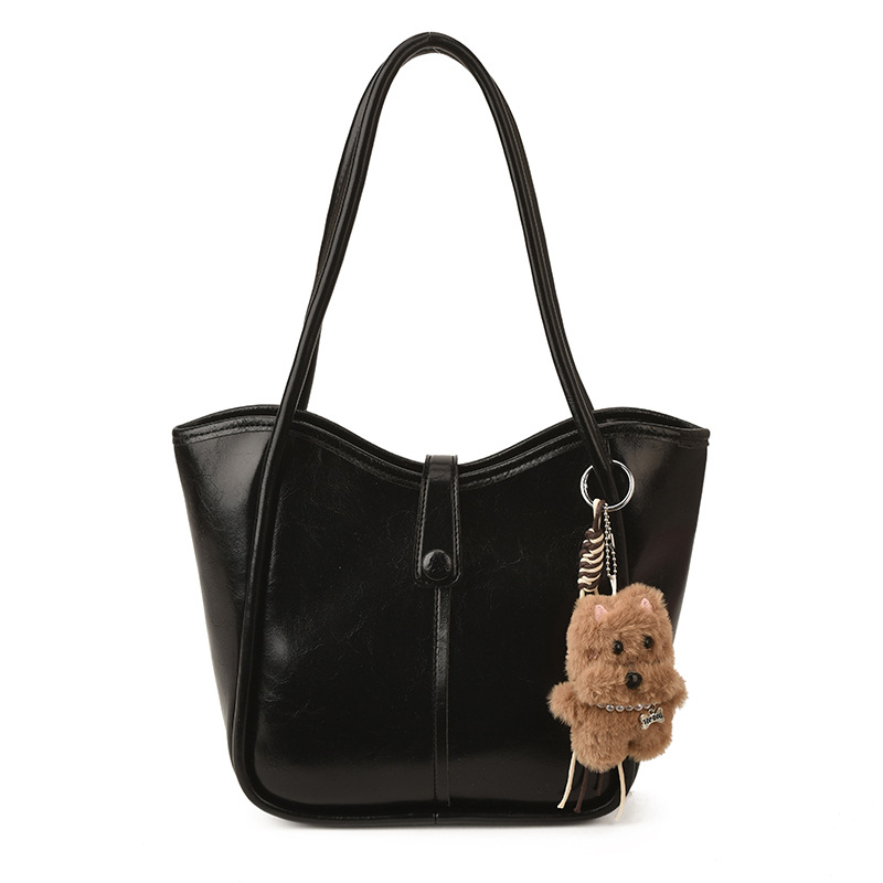 Este año, la moda simple bolso de cubo de mujer venta caliente nueva textura de alta calidad retro versátil lujo ligero bolso de hombro