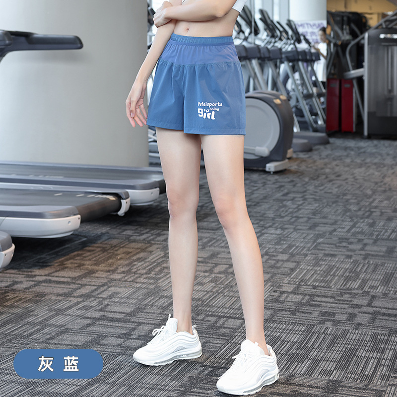 Fábrica de fuerza de tenis femenino forrado falso dos piezas de bádminton yoga deportivo rápido secado acondicionamiento físico pantalones de mujer