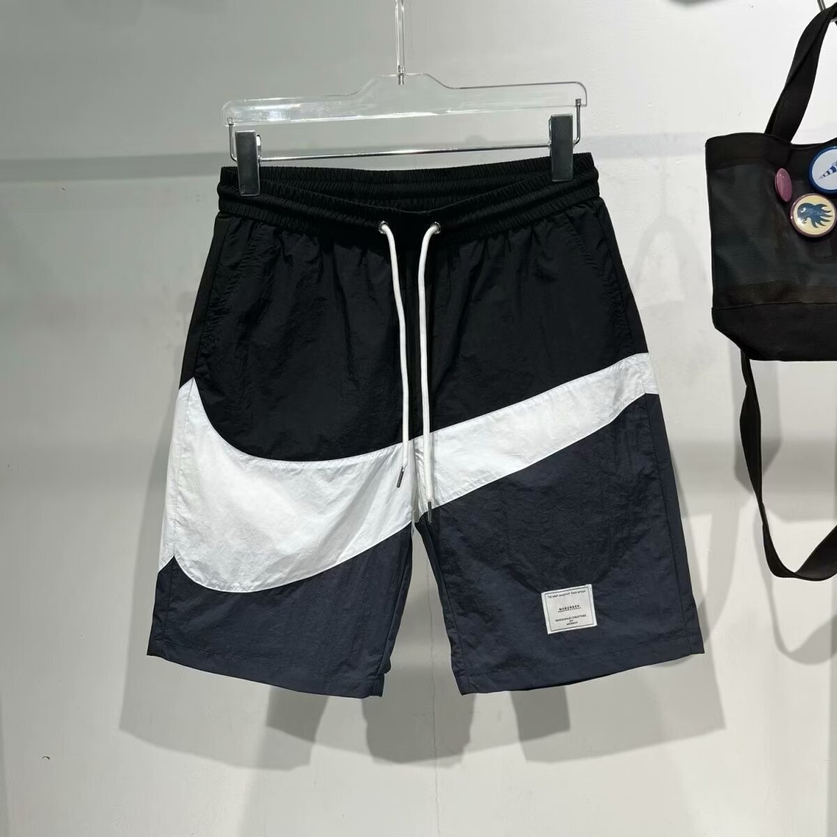 Verano de 2025 nuevos pantalones cortos de trabajo estadounidenses varones de verano de moda japonesa sueltos recto ocio rápido secado cinco puntos